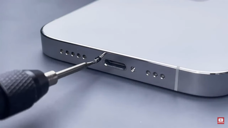 Opening Back Glass of Iphone 14 for Battery Repair With Screwdriver